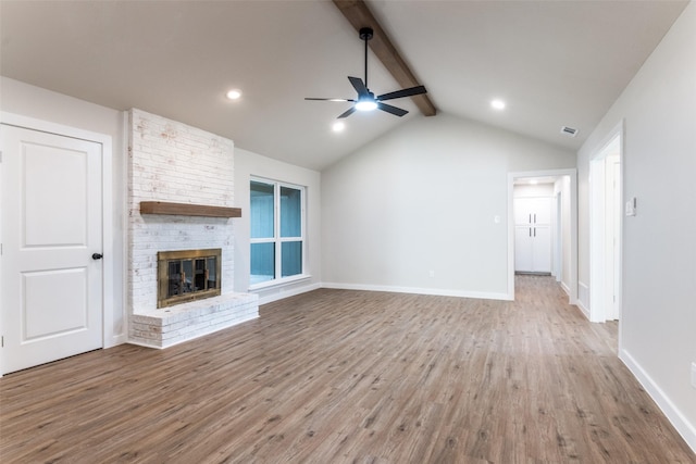 707 Lake Meadows Dr, Rockwall, TX 75087 - unfurnished living room featuring a ceiling fan, wood finished floors, a fireplace, and recessed lighting