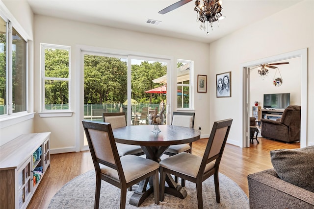 750 Emerald Sound Blvd, Oak Point, TX 75068 - dining space with ceiling fan and light wood-type flooring