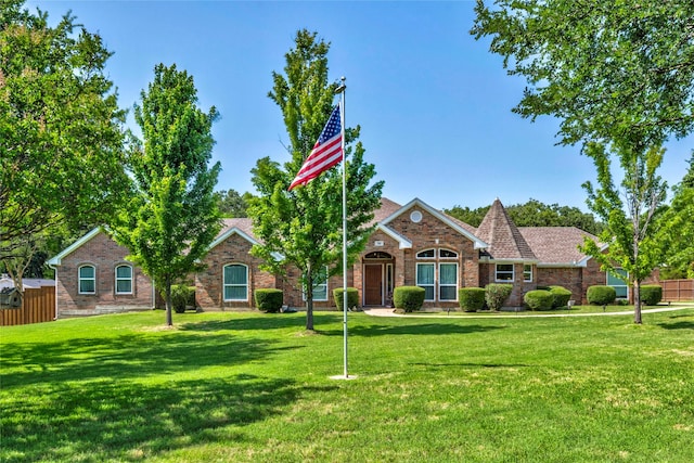 750 Emerald Sound Blvd, Oak Point, TX 75068 - view of front of home with a front yard and brick siding