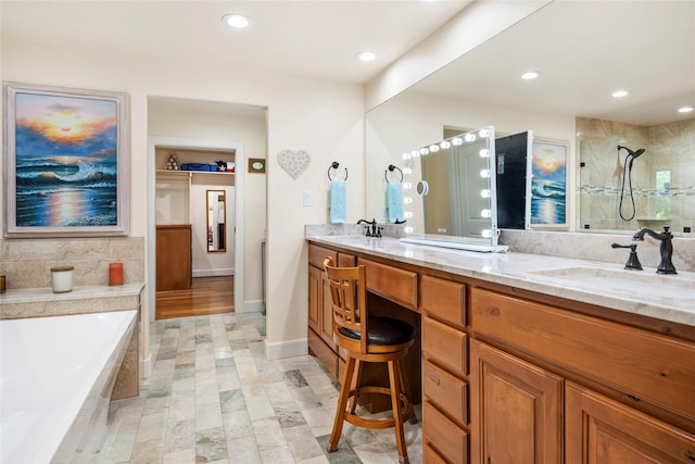 750 Emerald Sound Blvd, Oak Point, TX 75068 - bathroom with double vanity, a bath, a tile shower, and recessed lighting