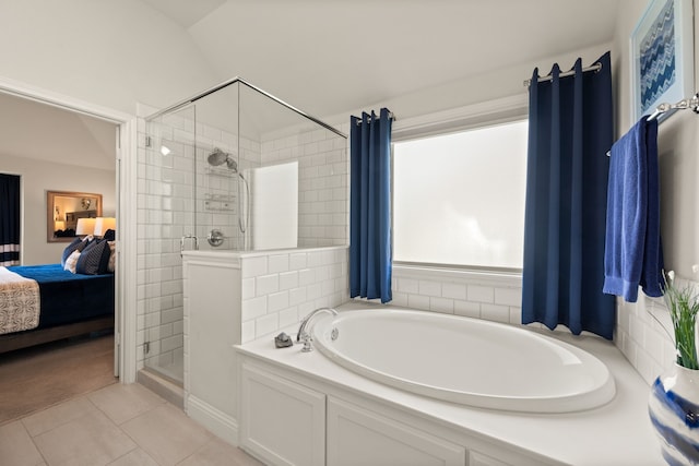 1105 Denton Creek Dr, Justin, TX 76247 - ensuite bathroom featuring a shower stall, a bath, and tile patterned flooring