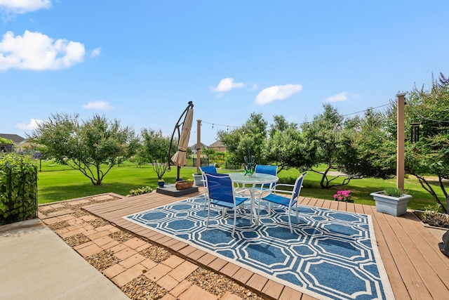 1105 Denton Creek Dr, Justin, TX 76247 - view of patio featuring outdoor dining area and a wooden deck