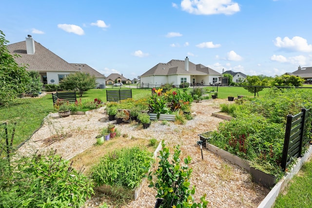 1105 Denton Creek Dr, Justin, TX 76247 - view of yard featuring a garden and a residential view