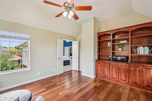6903 Glenview Ln, Colleyville, TX 76034 - unfurnished room featuring vaulted ceiling, wood finished floors, and a ceiling fan