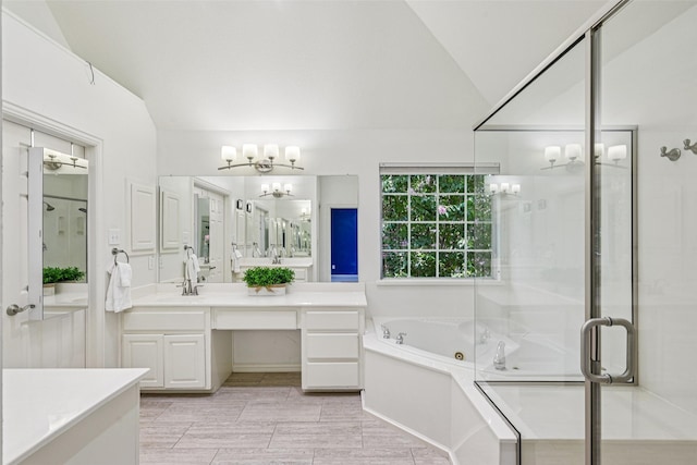 6903 Glenview Ln, Colleyville, TX 76034 - bathroom with a chandelier, lofted ceiling, a whirlpool tub, vanity, and a stall shower