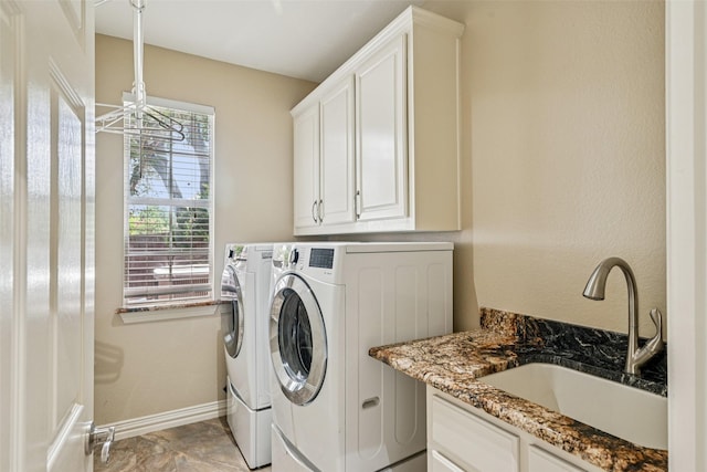 6903 Glenview Ln, Colleyville, TX 76034 - washroom with independent washer and dryer, cabinet space, and a chandelier