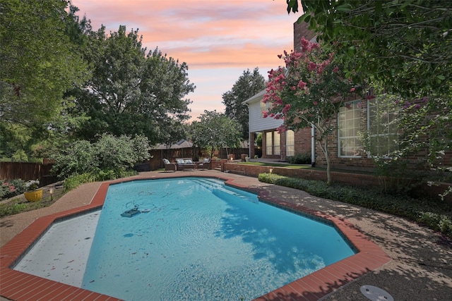 6903 Glenview Ln, Colleyville, TX 76034 - view of swimming pool featuring a fenced backyard, a patio, and an outdoor living space