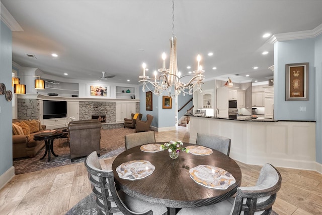 5106 Oak Ln, Arlington, TX 76017 - dining space featuring stairway, built in features, ornamental molding, recessed lighting, and a fireplace