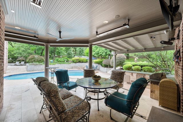 5106 Oak Ln, Arlington, TX 76017 - view of patio with a ceiling fan and an outdoor pool