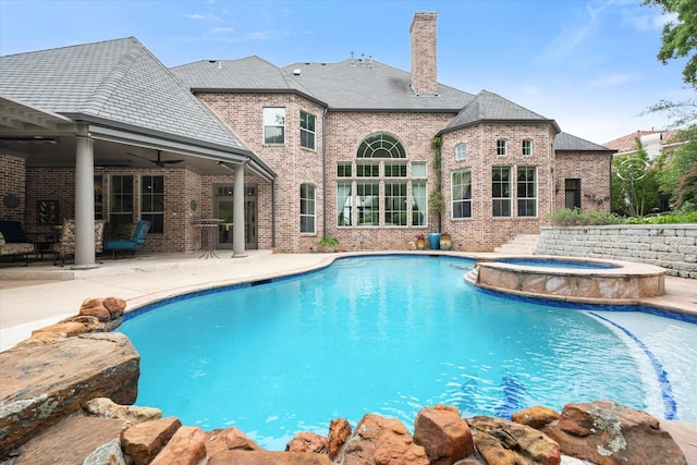 5106 Oak Ln, Arlington, TX 76017 - view of swimming pool featuring a ceiling fan, a patio, and a pool with connected hot tub