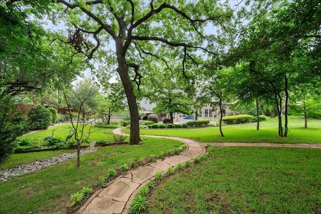 5106 Oak Ln, Arlington, TX 76017 - view of home's community with a lawn