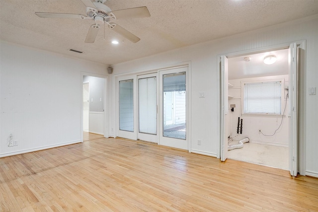 108 Smallwood Dr, Westworth Village, TX 76114 - empty room featuring ornamental molding, a textured ceiling, light wood finished floors, and a ceiling fan
