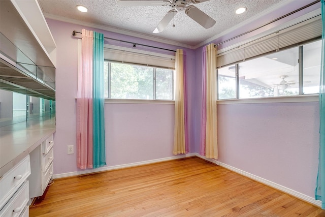 108 Smallwood Dr, Westworth Village, TX 76114 - empty room featuring a ceiling fan, crown molding, light wood-type flooring, a textured ceiling, and recessed lighting