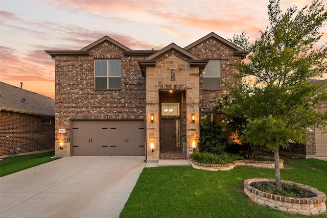1424 Archway Ct, Fort Worth, TX 76247 - view of front of home with an attached garage, driveway, a lawn, and brick siding