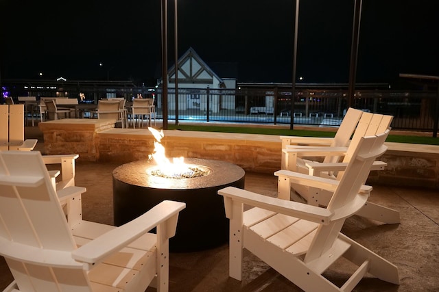 1424 Archway Ct, Fort Worth, TX 76247 - patio at twilight with an outdoor fire pit