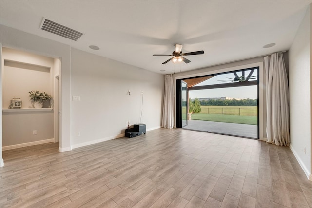 1424 Archway Ct, Fort Worth, TX 76247 - empty room featuring a ceiling fan and light wood finished floors