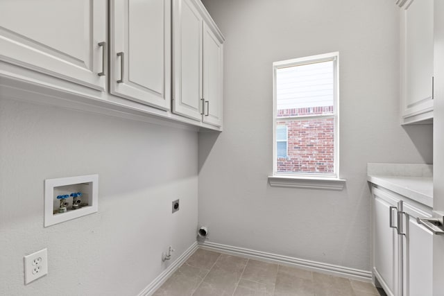 5912 Lindfield Ct, Plano, TX 75093 - laundry room with electric dryer hookup, hookup for a washing machine, and cabinet space