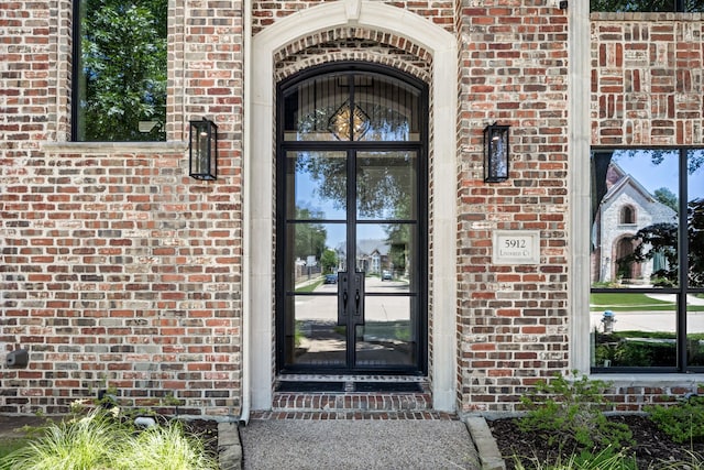 5912 Lindfield Ct, Plano, TX 75093 - doorway to property with brick siding and french doors