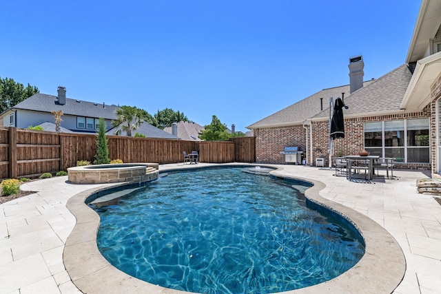 5912 Lindfield Ct, Plano, TX 75093 - view of swimming pool with a patio, a fenced backyard, a pool with connected hot tub, and area for grilling