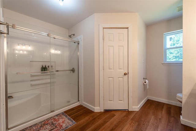 103 Irvin Ln, Mount Vernon, TX 75457 - full bath with a shower stall and wood finished floors
