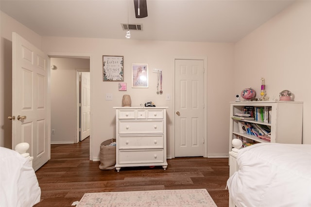 103 Irvin Ln, Mount Vernon, TX 75457 - bedroom with dark wood-style floors and a ceiling fan