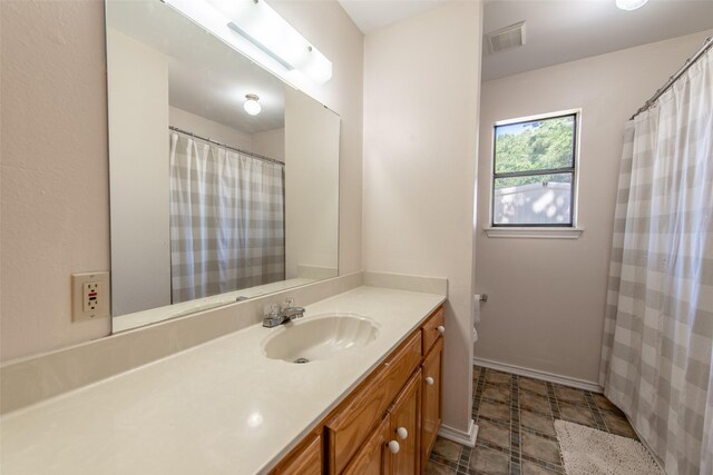 103 Irvin Ln, Mount Vernon, TX 75457 - full bathroom with vanity and tile patterned floors