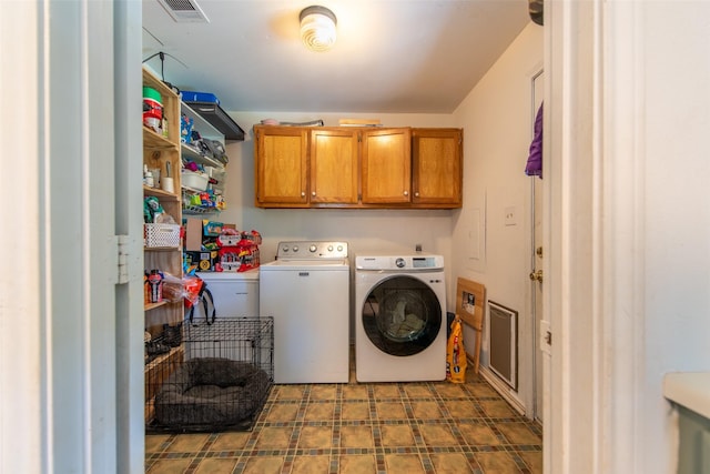 103 Irvin Ln, Mount Vernon, TX 75457 - washroom with cabinet space, washing machine and clothes dryer, and tile patterned floors