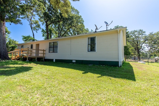 103 Irvin Ln, Mount Vernon, TX 75457 - rear view of property with a deck and crawl space