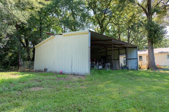 103 Irvin Ln, Mount Vernon, TX 75457 - view of pole building with a yard and a carport