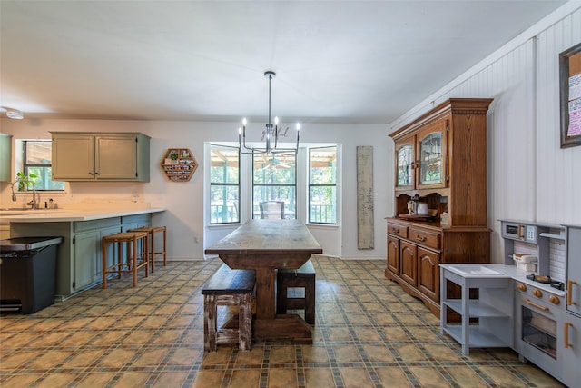 103 Irvin Ln, Mount Vernon, TX 75457 - dining space featuring a chandelier and tile patterned floors