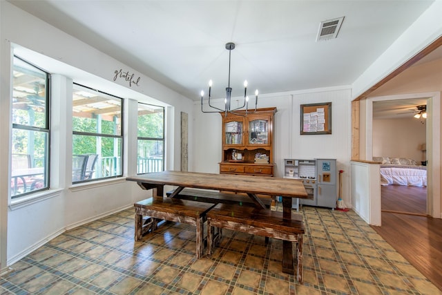 103 Irvin Ln, Mount Vernon, TX 75457 - dining space featuring healthy amount of natural light and a chandelier