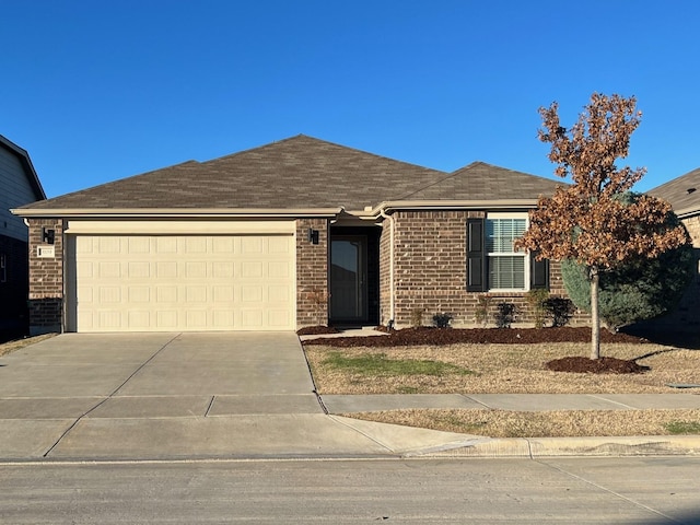 3109 Layla Creek Dr, Little Elm, TX 75068 - single story home with concrete driveway, an attached garage, brick siding, and roof with shingles