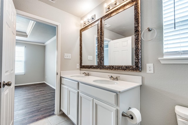 3109 Layla Creek Dr, Little Elm, TX 75068 - bathroom featuring double vanity, crown molding, and tile patterned floors