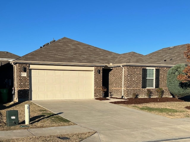 3109 Layla Creek Dr, Little Elm, TX 75068 - single story home featuring brick siding, concrete driveway, an attached garage, and roof with shingles