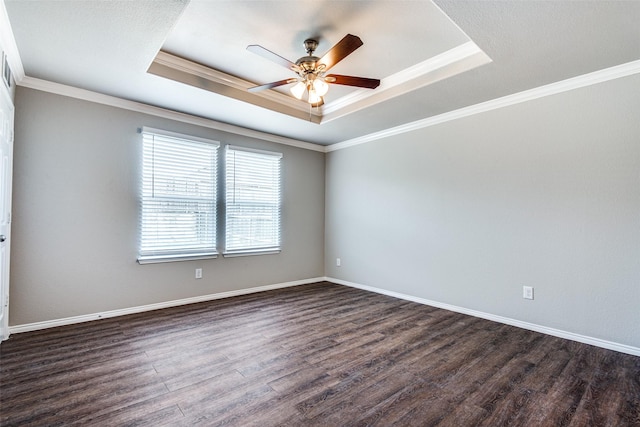 3109 Layla Creek Dr, Little Elm, TX 75068 - unfurnished room with a tray ceiling, a ceiling fan, dark wood-style floors, and ornamental molding