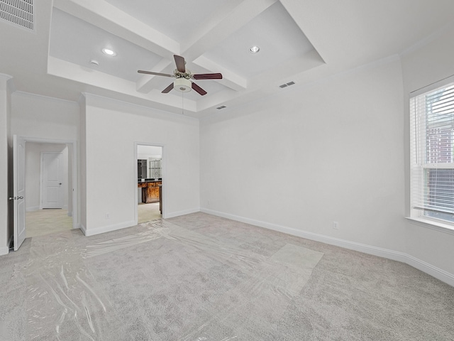 12815 Lourdes Ln, Frisco, TX 75035 - spare room featuring light colored carpet, coffered ceiling, ceiling fan, recessed lighting, and beam ceiling