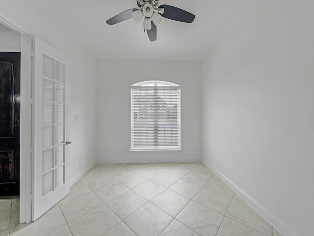 12815 Lourdes Ln, Frisco, TX 75035 - unfurnished room featuring light tile patterned flooring and a ceiling fan