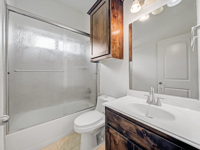 12815 Lourdes Ln, Frisco, TX 75035 - bathroom with vanity, enclosed tub / shower combo, and tile patterned floors