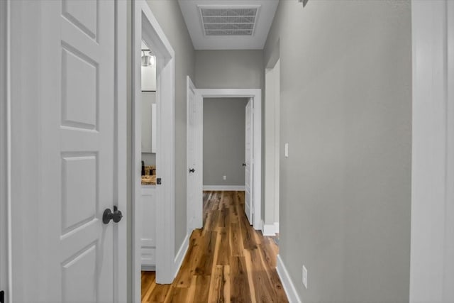 1002 E Main, Whitehouse, TX 75791 - corridor with wood finished floors and baseboards