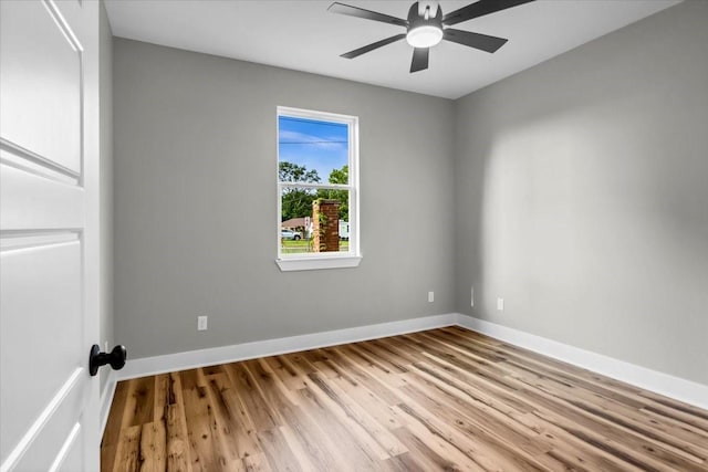 1002 E Main, Whitehouse, TX 75791 - unfurnished room featuring wood finished floors and ceiling fan