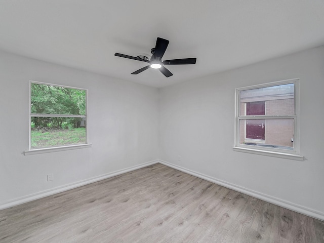 5537 Wheaton Dr, Fort Worth, TX 76133 - unfurnished room featuring light wood-type flooring and ceiling fan