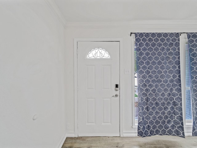 5537 Wheaton Dr, Fort Worth, TX 76133 - entryway with crown molding and wood finished floors