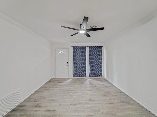 5537 Wheaton Dr, Fort Worth, TX 76133 - foyer entrance featuring crown molding, ceiling fan, and light wood-style flooring