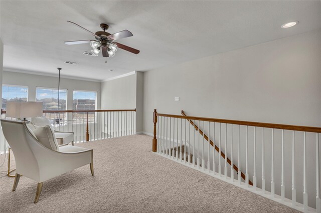 3537 Navarro Way, Frisco, TX 75034 - sitting room with a ceiling fan, carpet, an upstairs landing, and ornamental molding