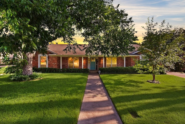 7329 Yolanda Dr, Fort Worth, TX 76112 - view of front of property with a front yard and brick siding
