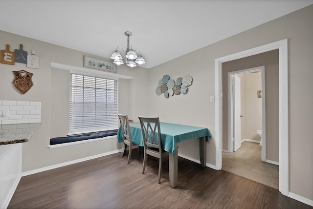 7329 Yolanda Dr, Fort Worth, TX 76112 - dining room with a chandelier and wood finished floors