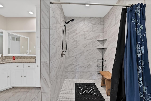 7329 Yolanda Dr, Fort Worth, TX 76112 - bathroom with vanity, tiled shower, and recessed lighting