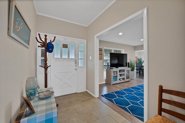 7329 Yolanda Dr, Fort Worth, TX 76112 - foyer with crown molding and tile patterned floors