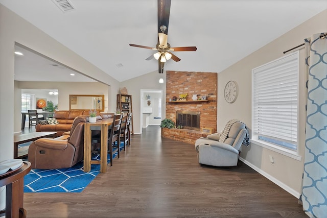 7329 Yolanda Dr, Fort Worth, TX 76112 - living area with ceiling fan, wood finished floors, and a fireplace