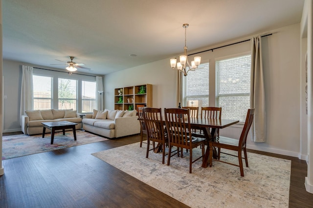 14613 Martin Creek Cv, Fort Worth, TX 76262 - dining space with healthy amount of natural light, dark wood-style flooring, ceiling fan, and a chandelier
